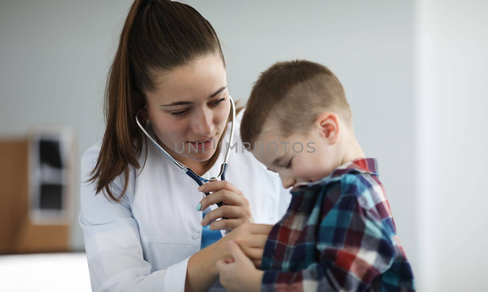 Smiling woman working in clinic by kuprevich