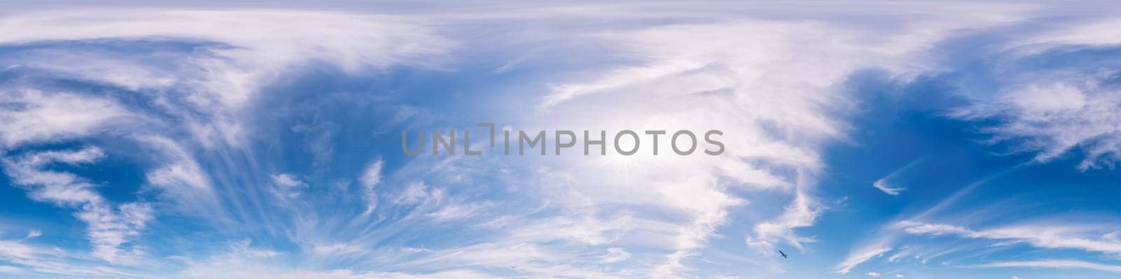 Bright sunset sky panorama with Cirrus clouds. Seamless hdr spherical equirectangular 360 panorama. Sky dome or zenith for 3D visualization, game and sky replacement for aerial drone 360 panoramas.