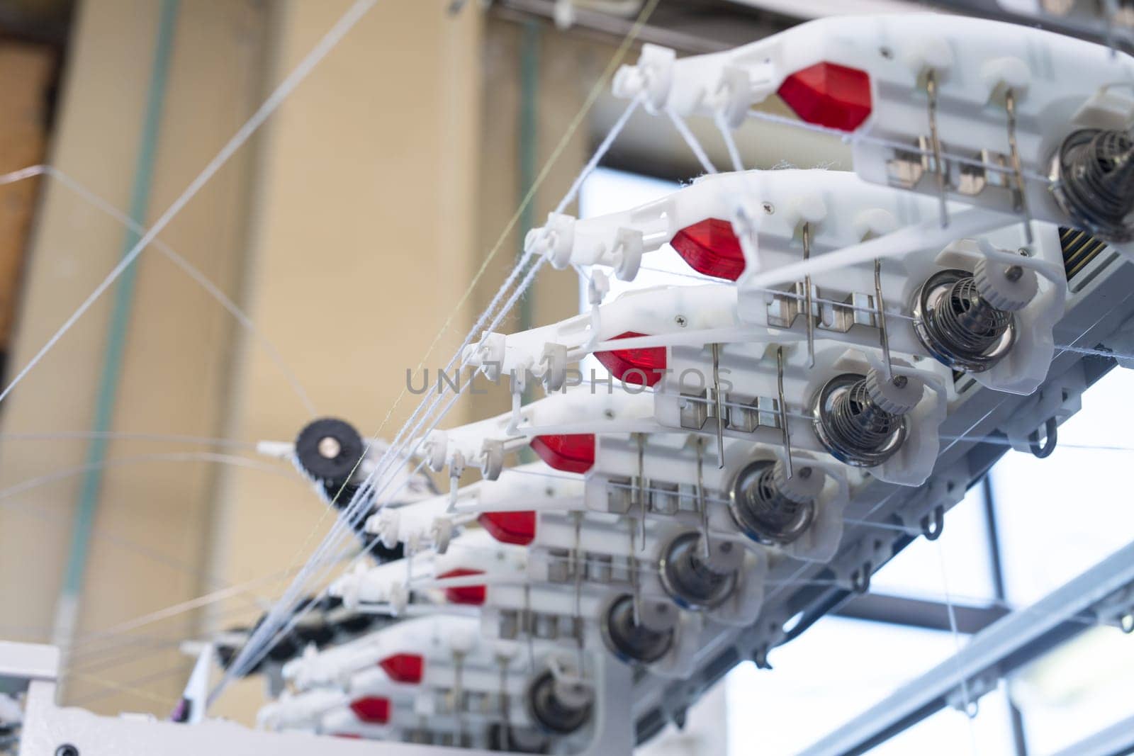 Automatic rewinding machine equipment at a knitting shop view