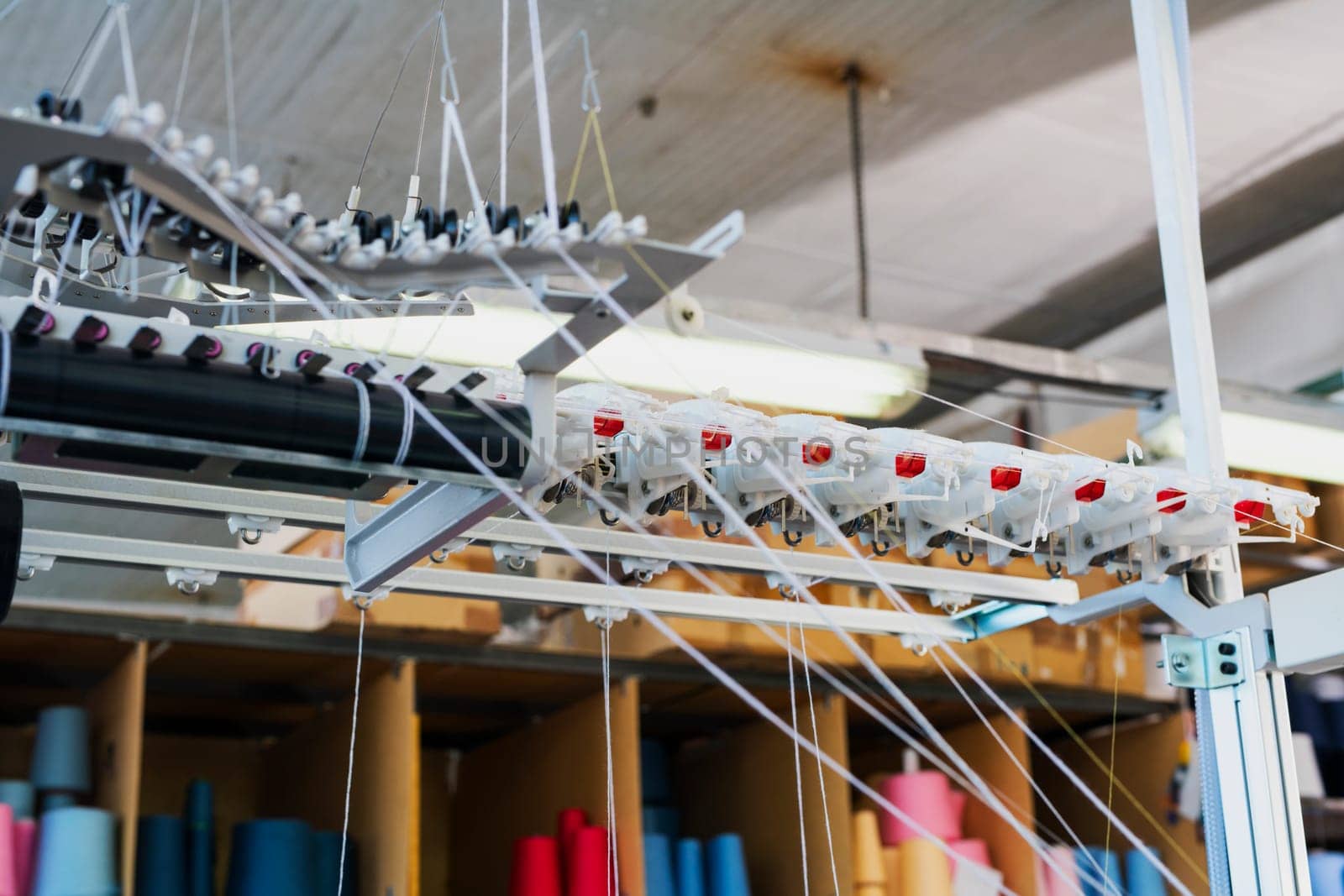 Automatic work of rewinding equipment at a knitting shop view
