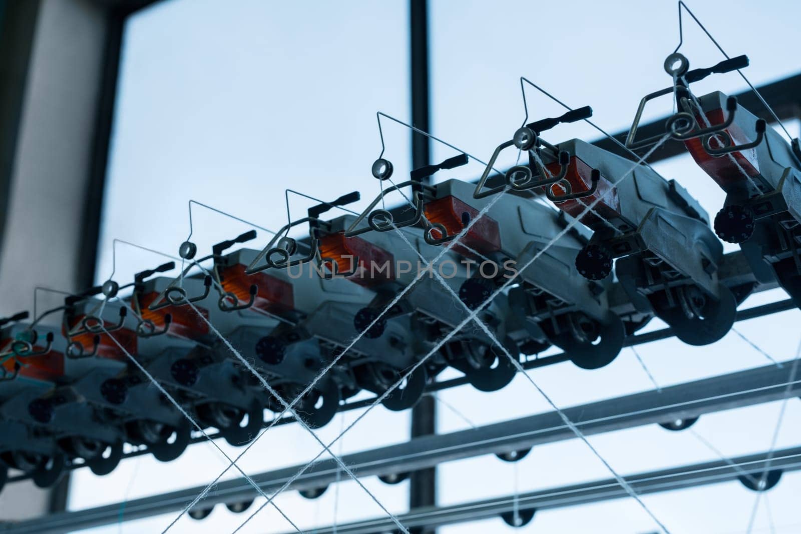Automatic rewinding machine equipment at a knitting factory view