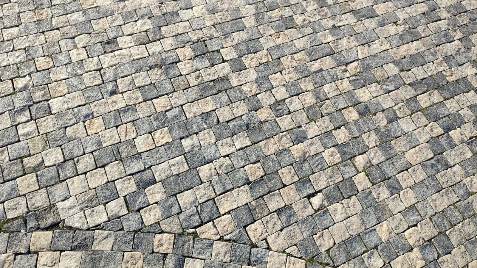 light and dark gray square tiles, road pedestrian pavement, texture background, industry construction. High quality photo