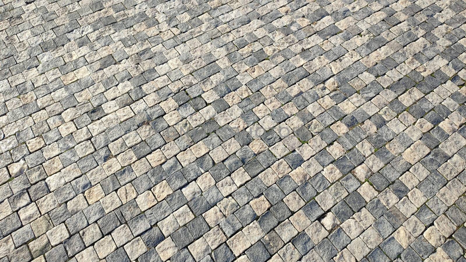 light and dark gray square tiles, road pedestrian pavement, texture background, industry construction. High quality photo
