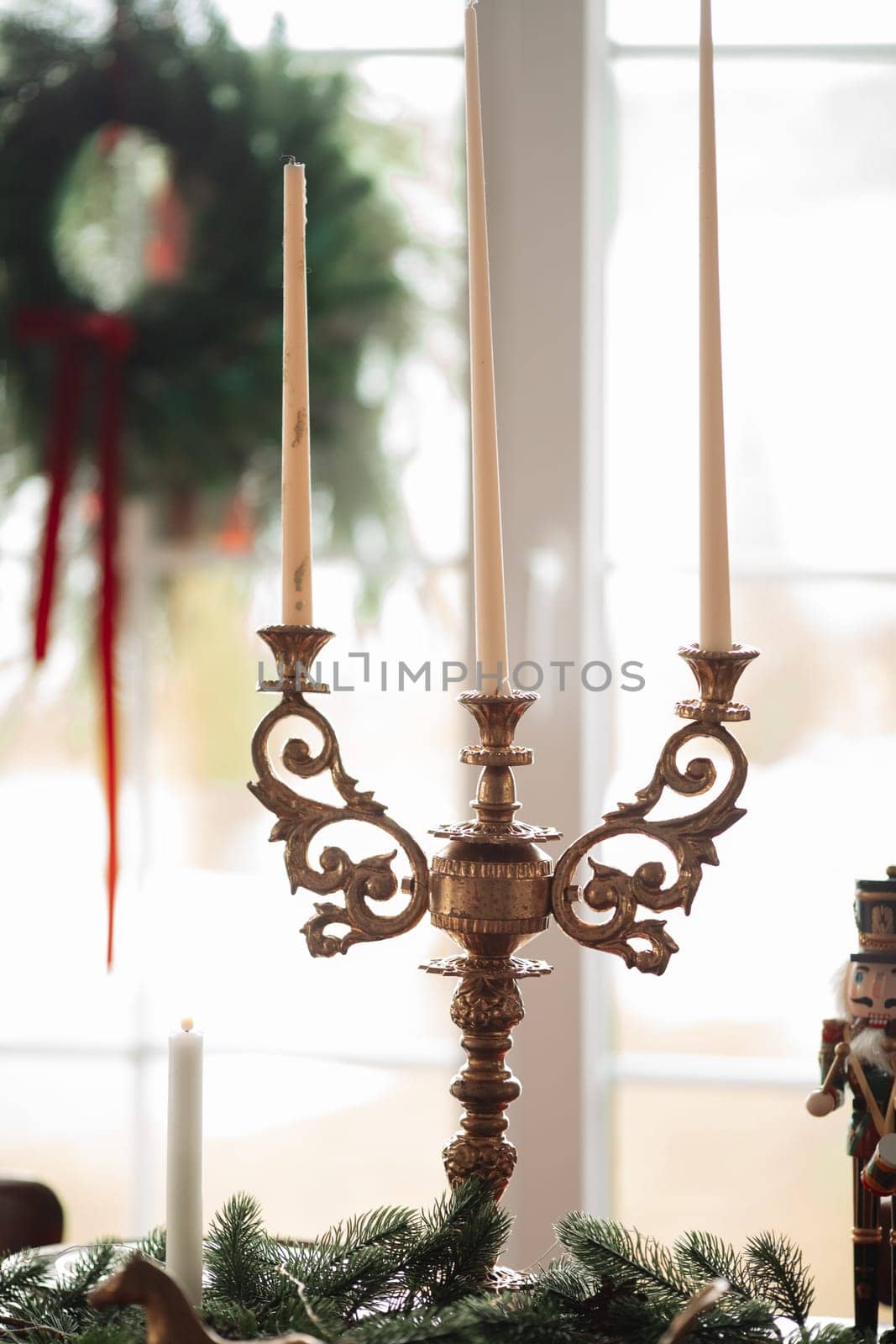 Beautiful Christmas decor. Decorating a room on a holiday. Stylish details.
