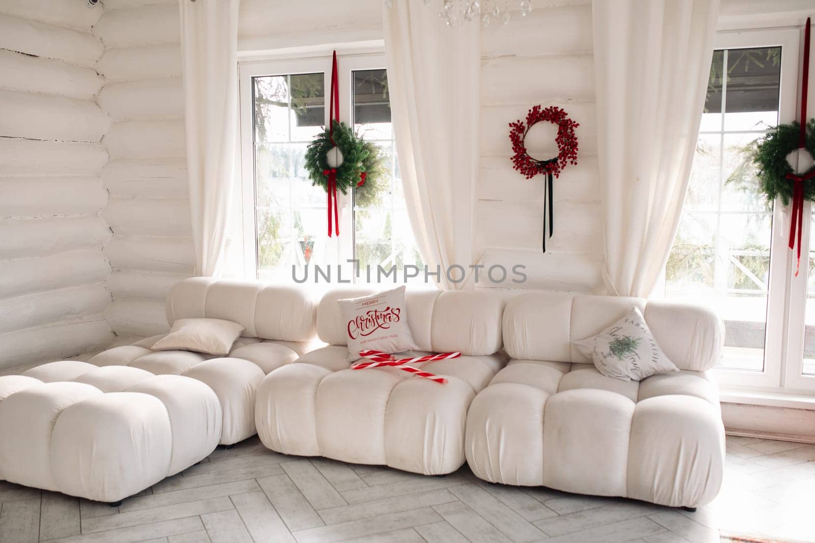 Stylish Christmas tree, New Year's interior, beautiful decor in the house.