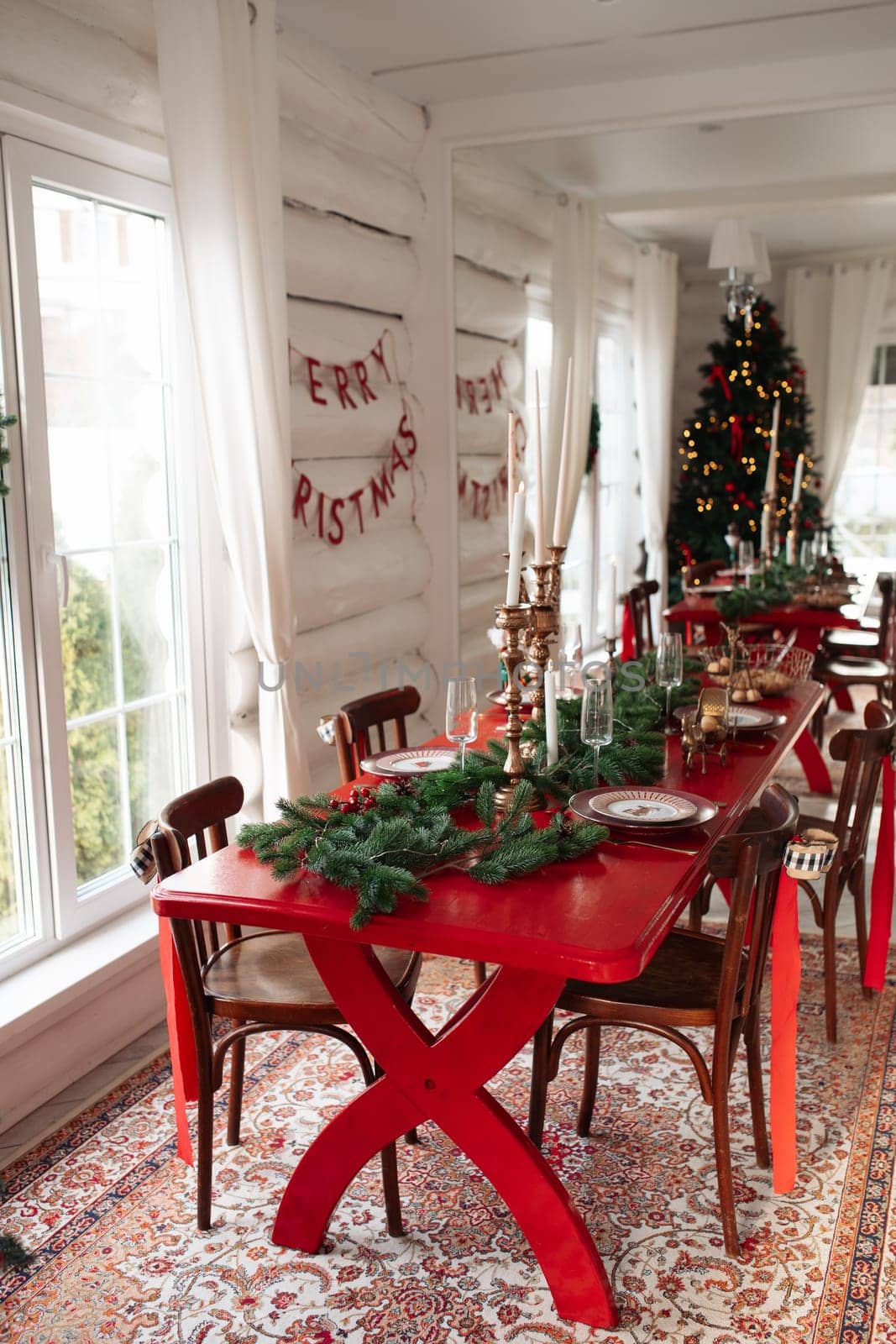 Stylish Christmas tree, New Year's interior, beautiful decor in the house.
