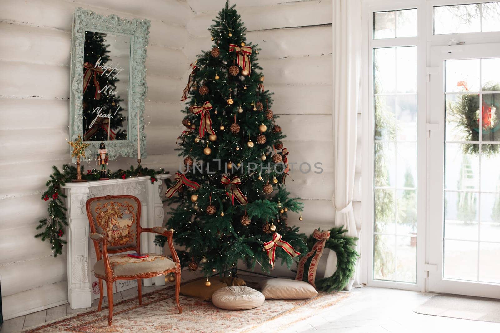Stylish Christmas tree, New Year's interior, beautiful decor in the house.