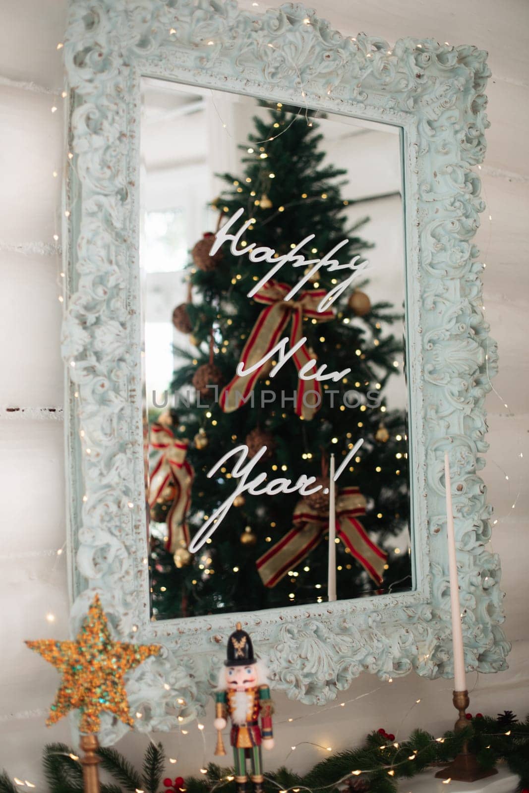 Beautiful Christmas decor. Decorating a room on a holiday. Stylish details.