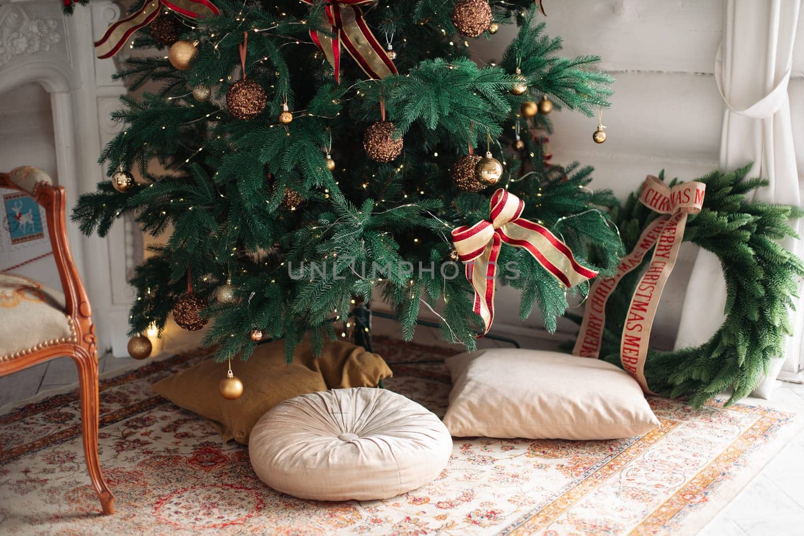 gifts under the tree, lots of gift boxes. Festive mood.