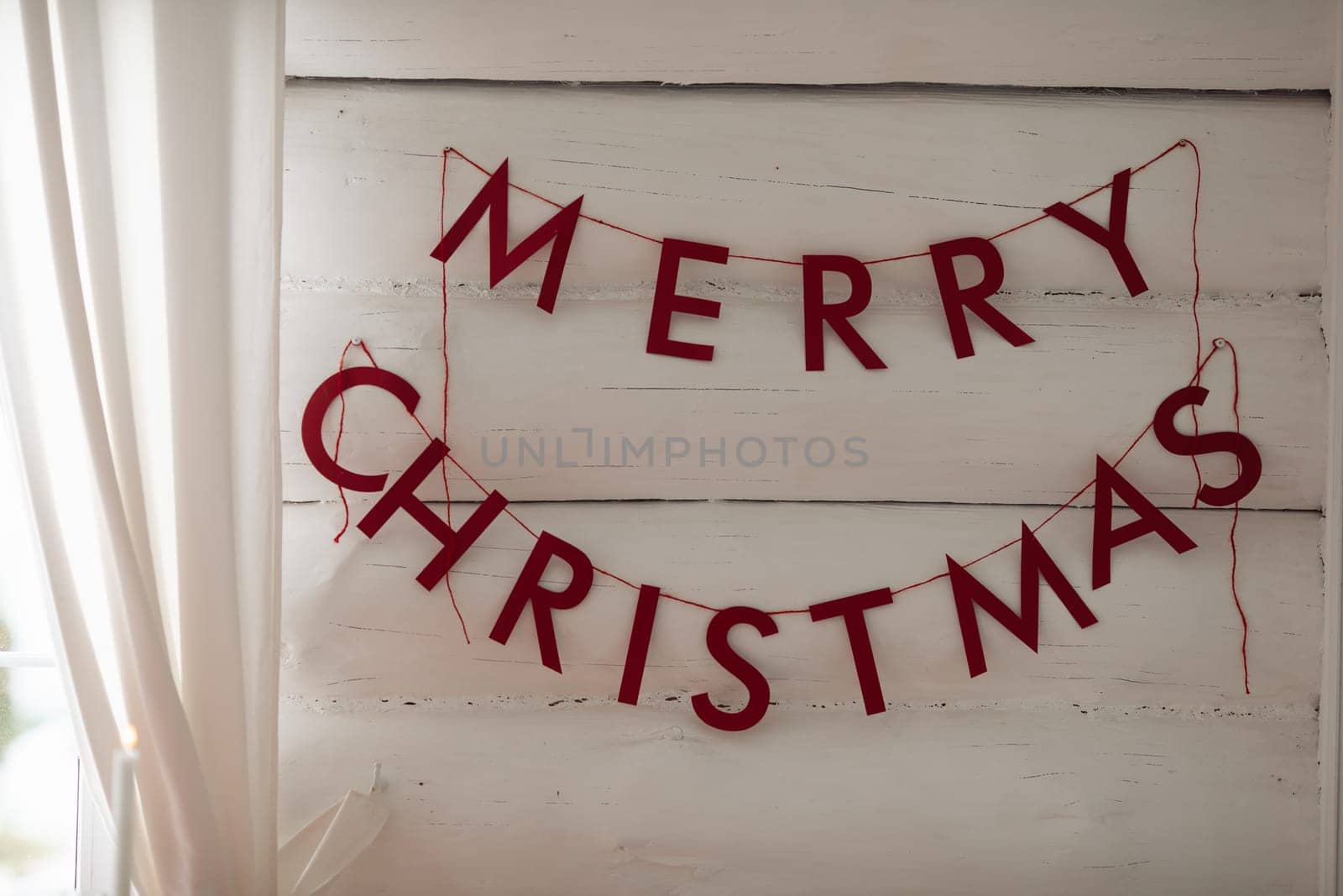 Beautiful Christmas decor. Decorating a room on a holiday. Stylish details.