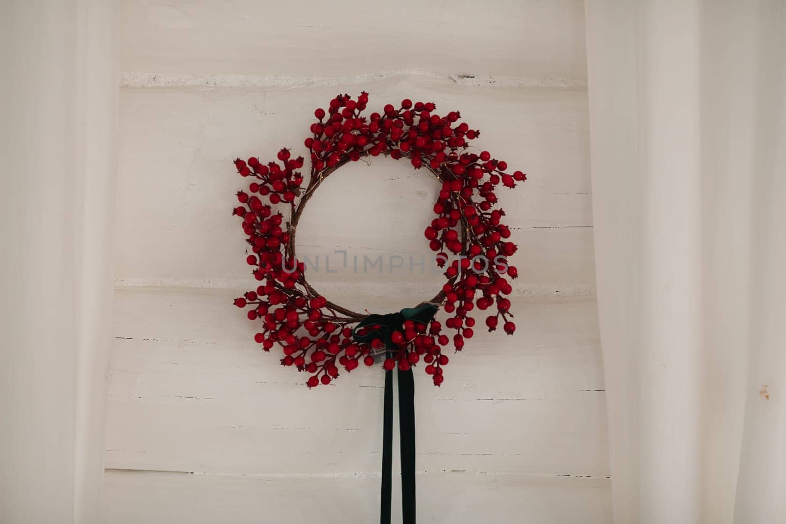 Beautiful Christmas decor. Decorating a room on a holiday. Stylish details.