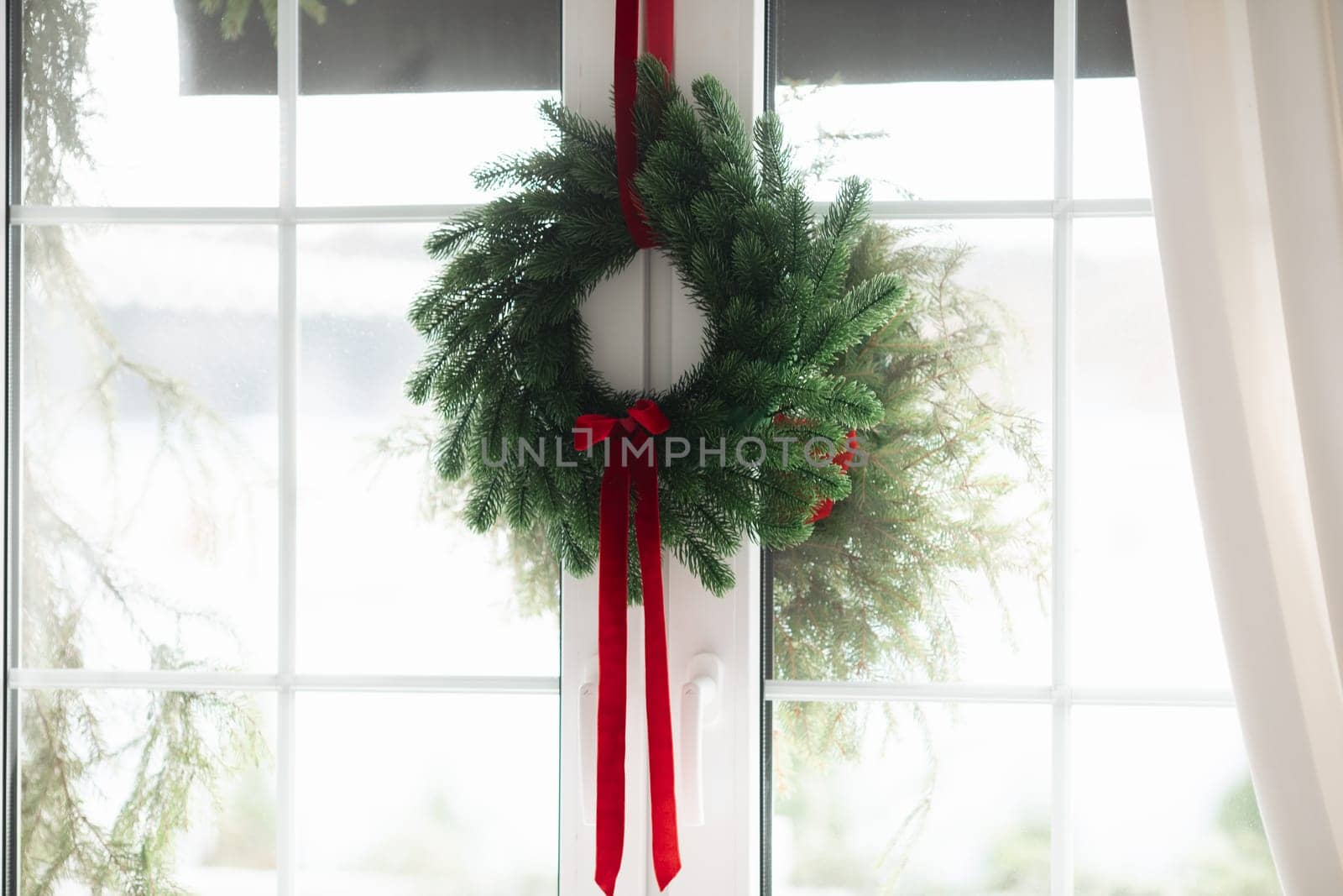 Beautiful Christmas decor. Decorating a room on a holiday. Stylish details.