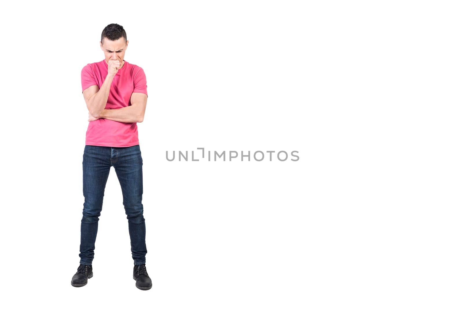 Full body of doubting male model in casual outfit standing with hand at chin and trying to solve problem on white background