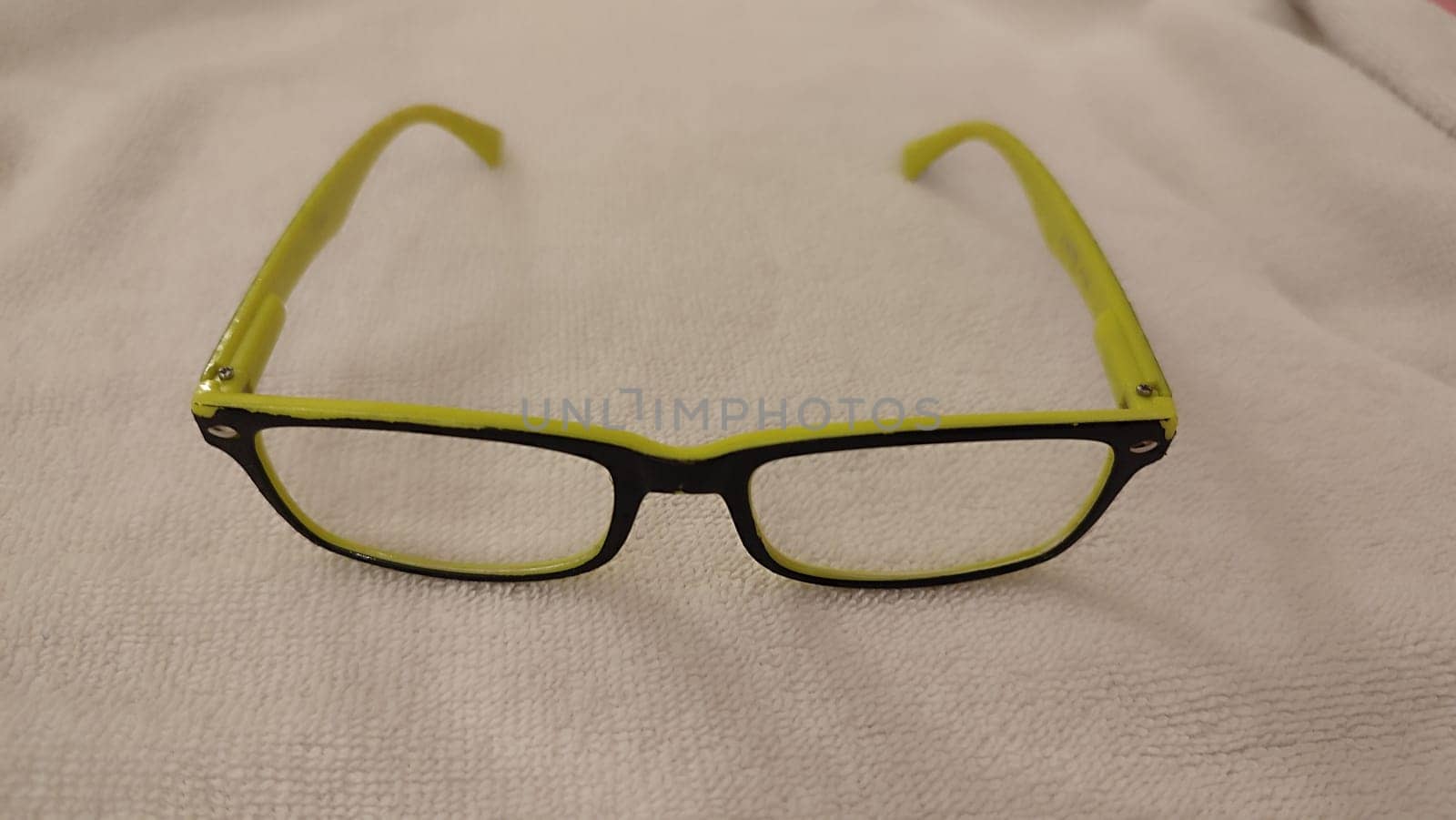 reading glasses, yellow black frame, object health medicine, ophthalmologist. High quality photo