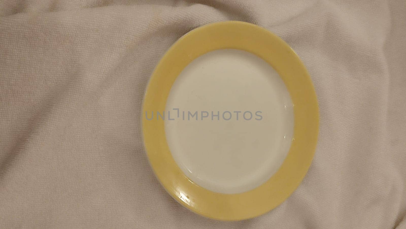 yellow white round plate ceramics object homeware, kitchen . High quality photo