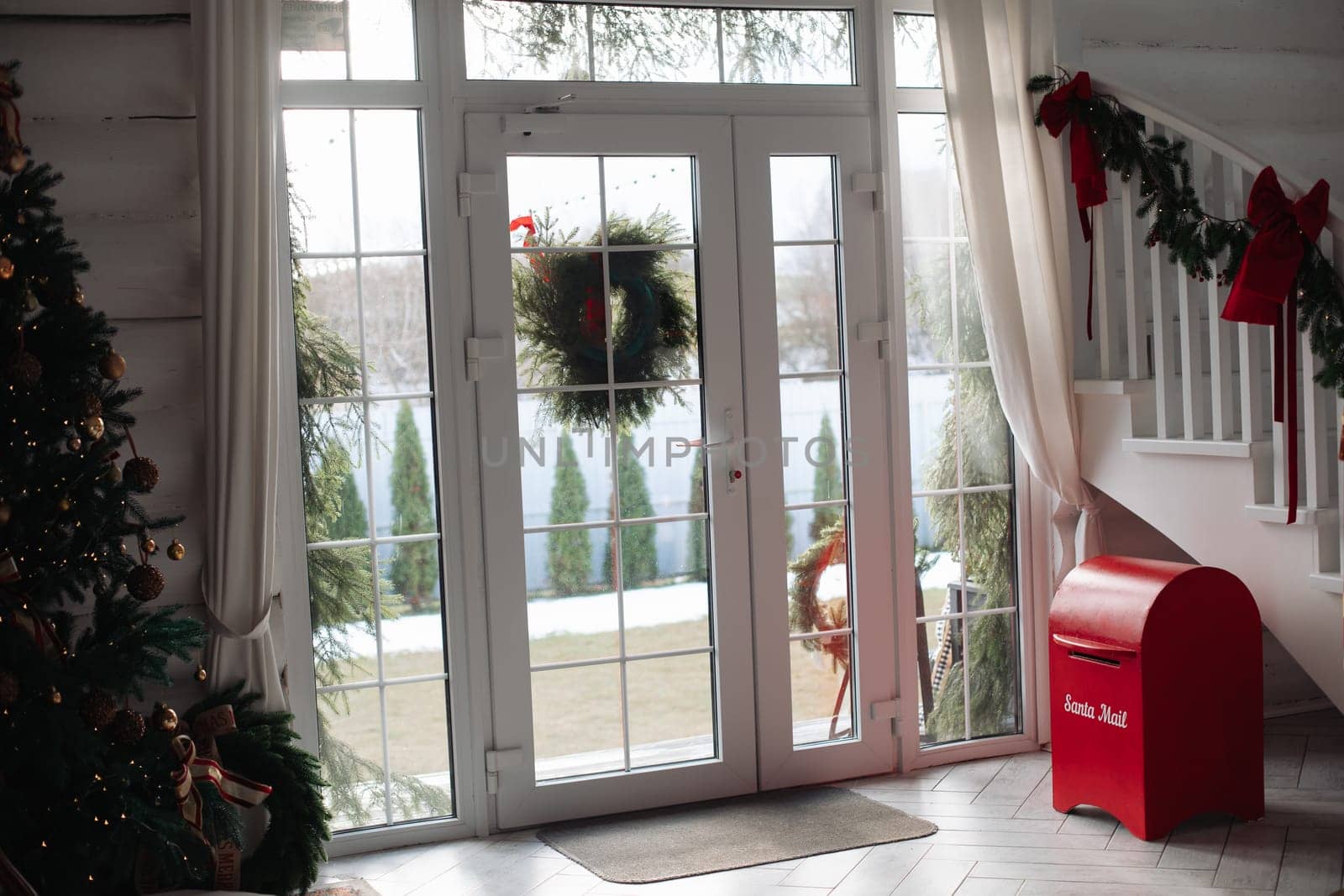 Stylish Christmas tree, New Year's interior, beautiful decor in the house.