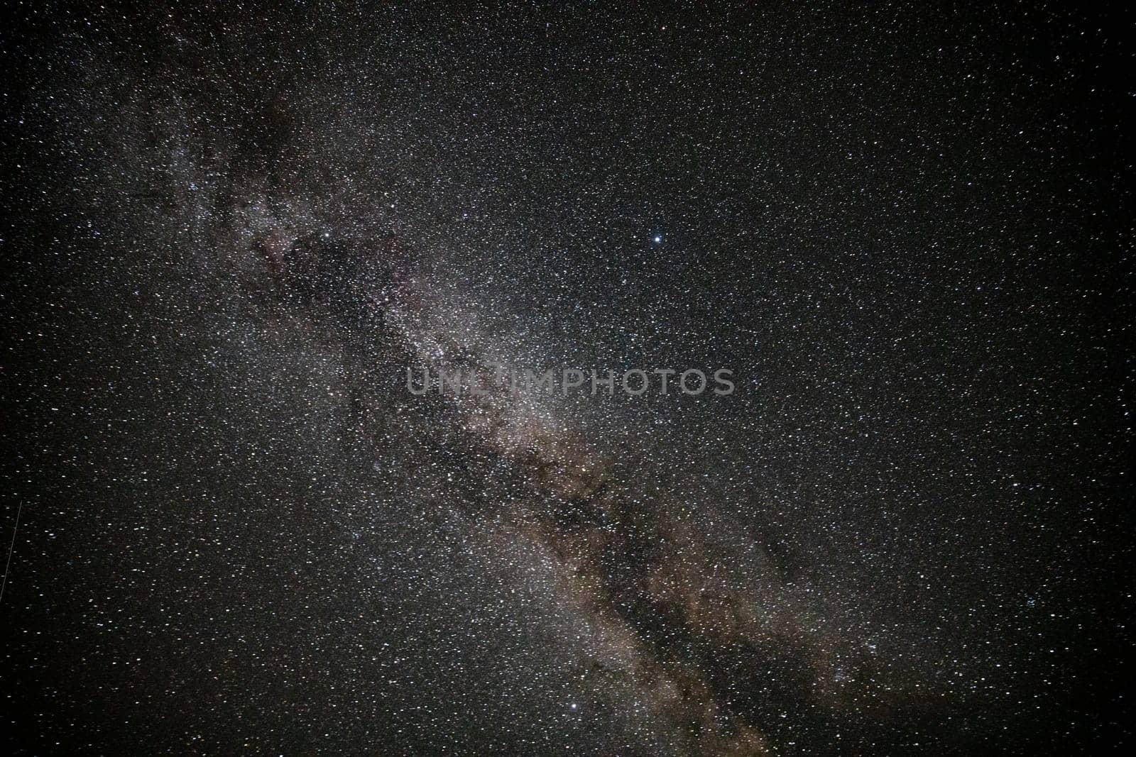 A breathtaking capture of the starry night sky featuring the Milky Way. Perfect for conveying wonder, infinity, and the beauty of the universe.