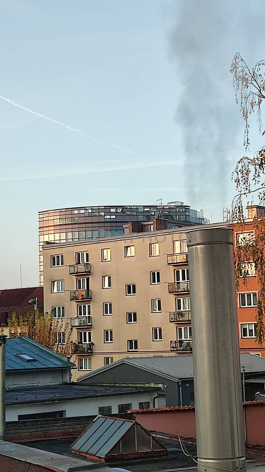 City day landscape, town building architecture background photo,pipe smoke, blue sky fall,October 22 2024 Hradec Kralove, Czech Republic Europe, Kralov region. High quality photo