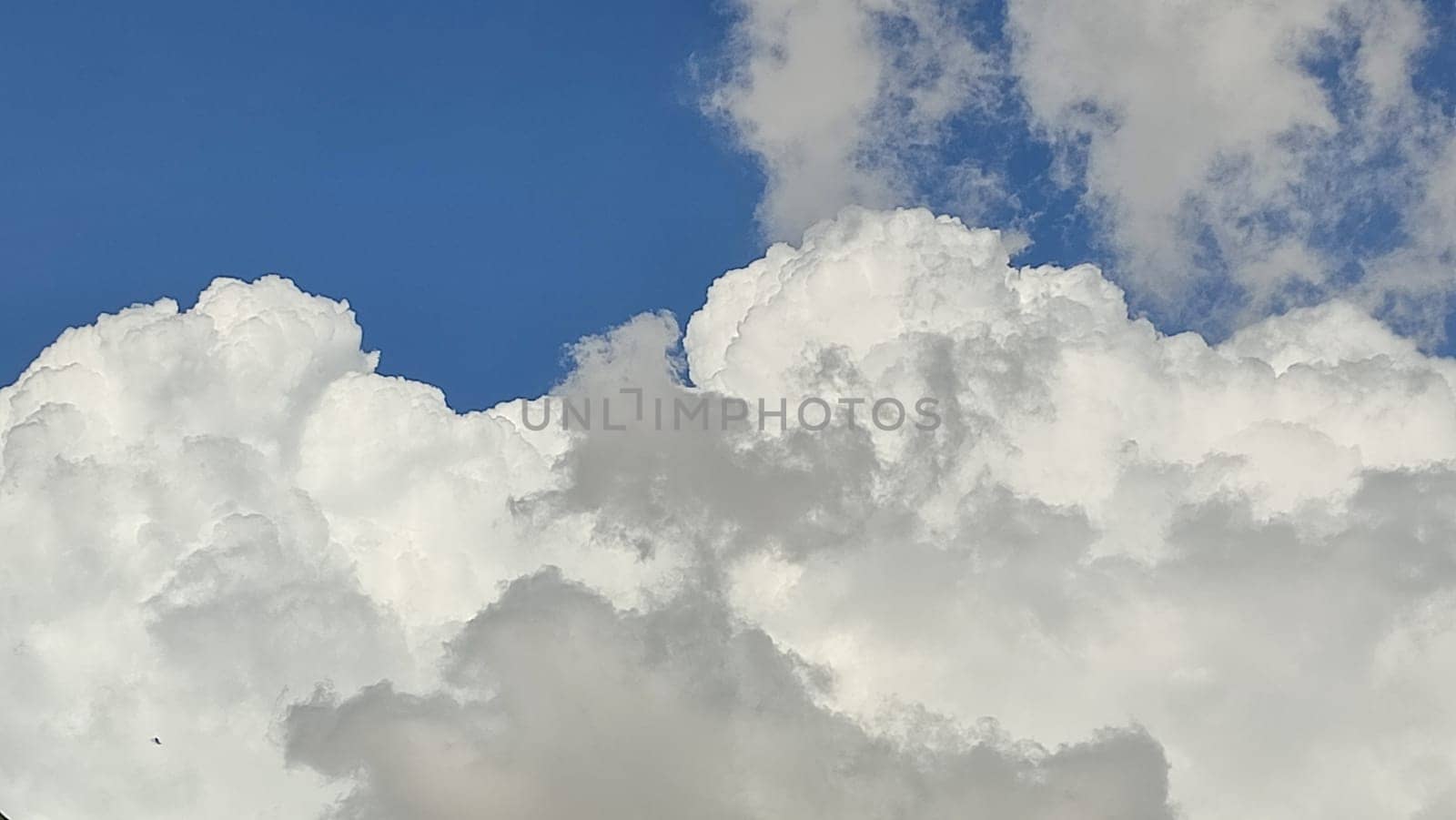 blue sky white clouds background nature air atmosphere weather, round sin light. High quality photo