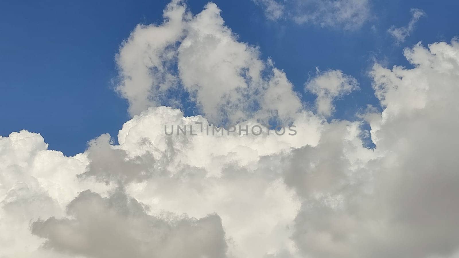 blue sky white clouds background nature air atmosphere weather, round sin light. High quality photo