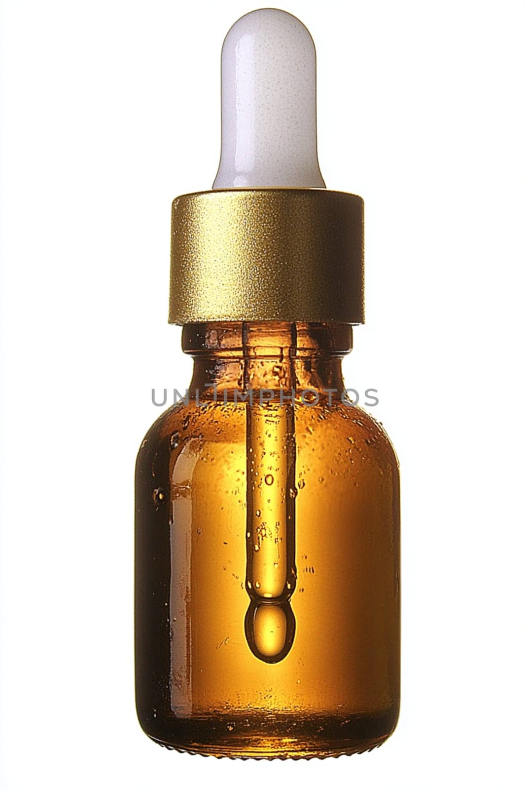 Glass dropper bottle filled with a golden liquid is dripping, showcasing its potential for beauty, health, or pharmaceutical applications