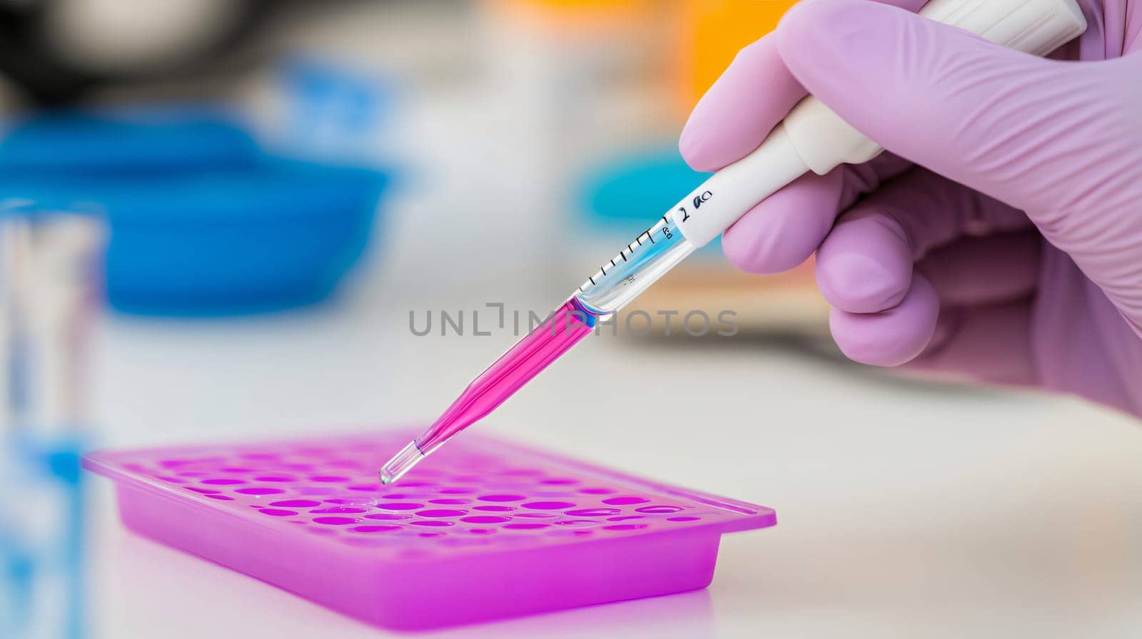 Scientist wearing purple gloves is using a pipette to transfer a sample to a multiwell plate in a laboratory setting