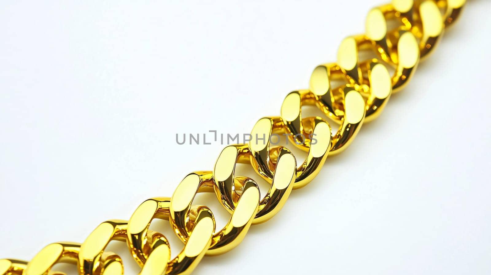 Shiny golden chain with oval links on white background, ideal for themes like jewelry, luxury, or fashion