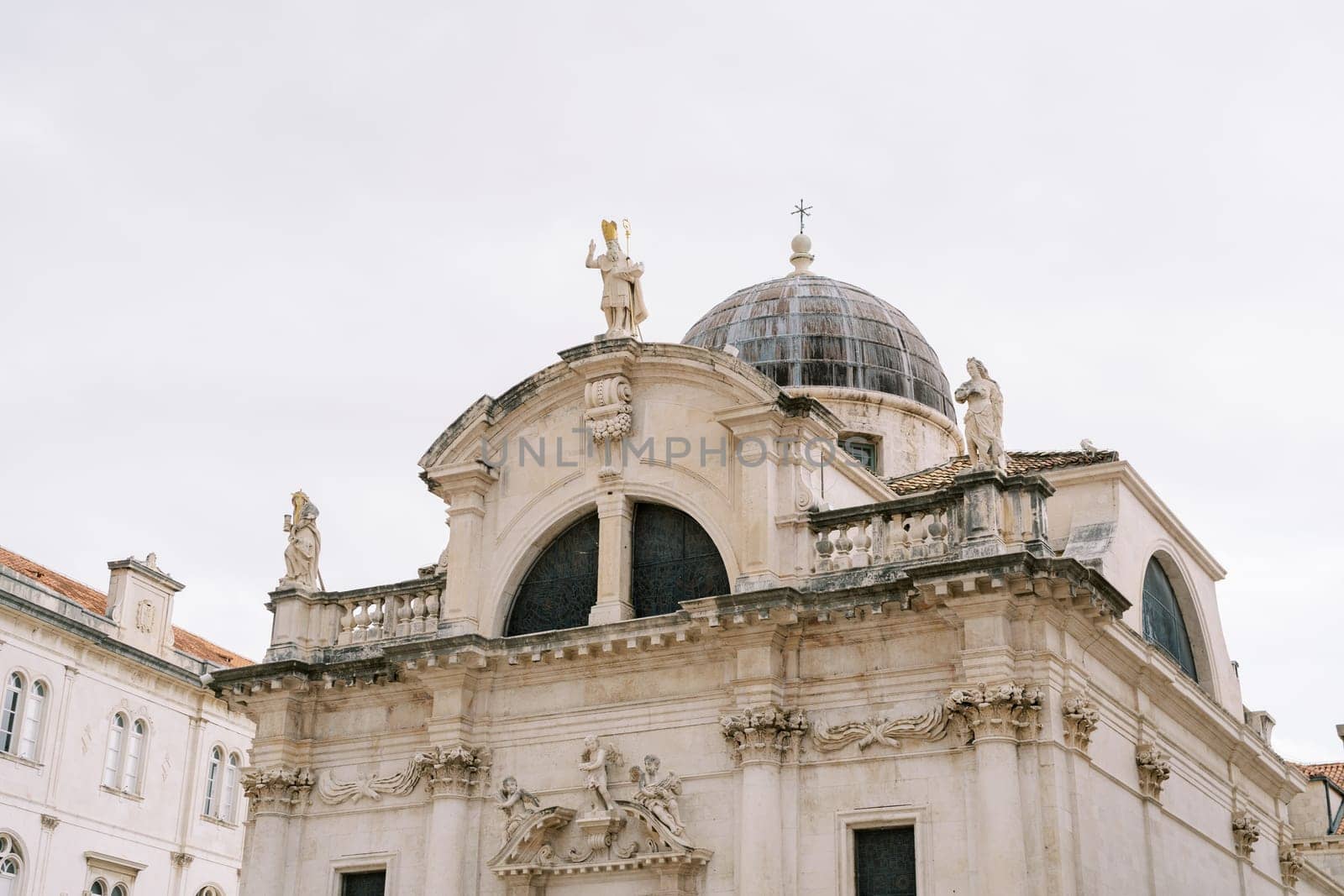 Statues on the roof of the Church of St. Blaise. Dubrovnik, Croatia. High quality photo