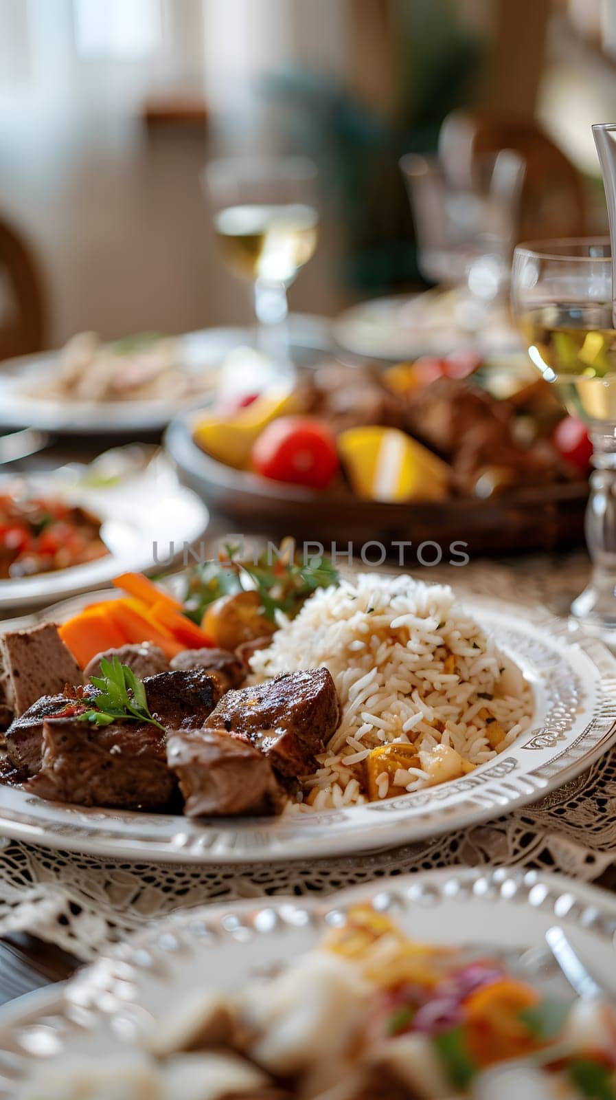 A gourmet feast on an elegant table featuring diverse dishes and glasses of wine.