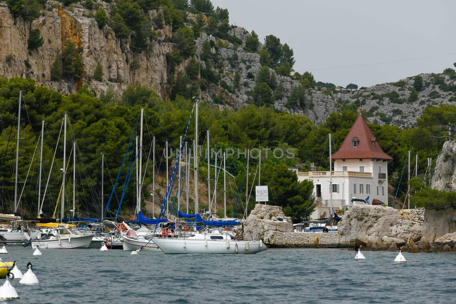 Marseille, France - June 9, 2024 : Calanque of Marseille on the Coast of Provence, Calanques National Park seen from an excursion boat cruising, High quality 4k footage