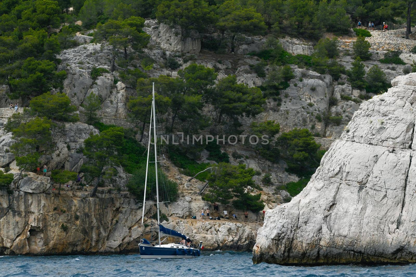 Marseille, France - June 9, 2024 : Calanque of Marseille on the Coast of Provence, Calanques National Park seen from an excursion boat cruising, High quality 4k footage