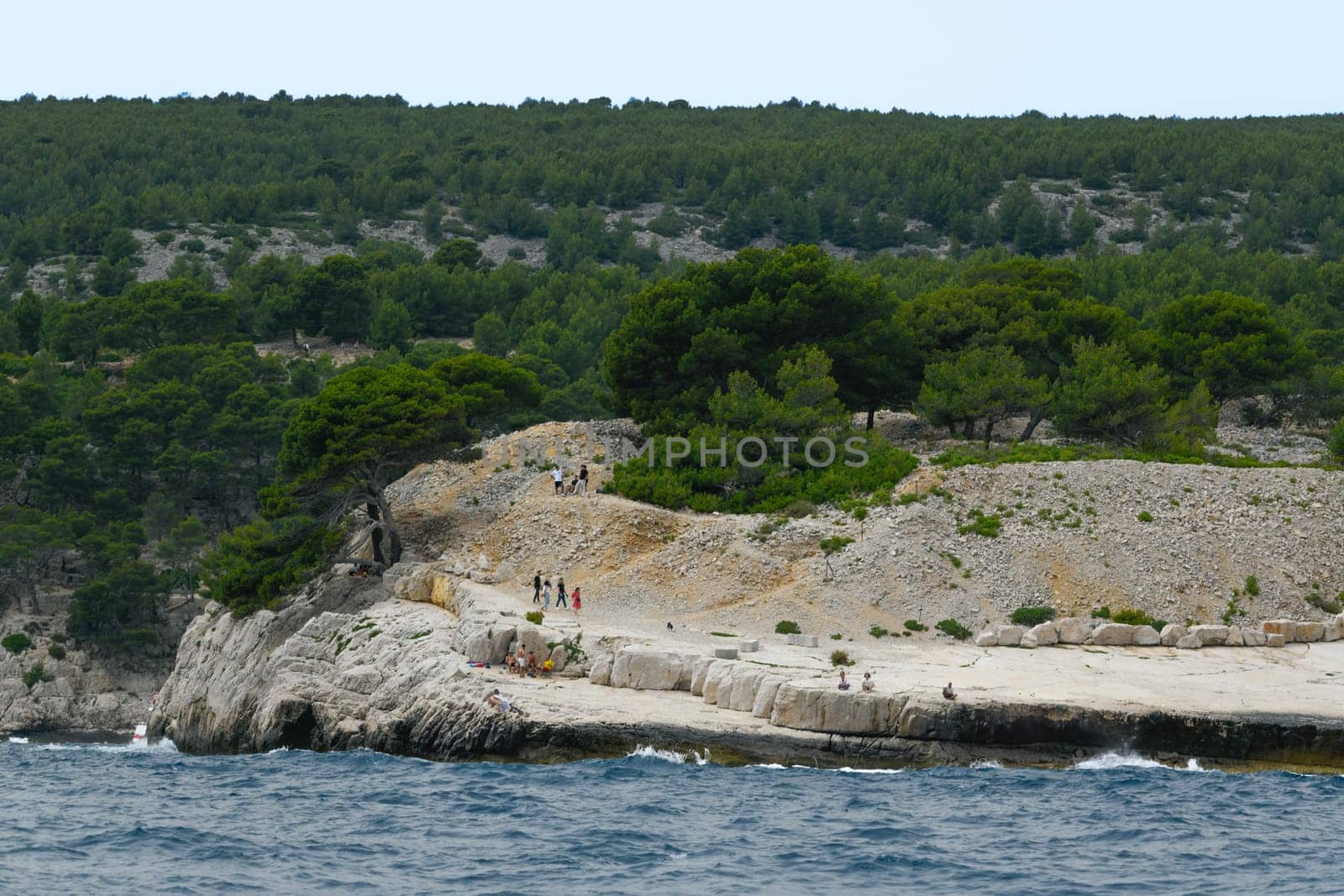 Marseille, France - June 9, 2024 : Calanque of Marseille on the Coast of Provence, Calanques National Park seen from an excursion boat cruising, High quality 4k footage