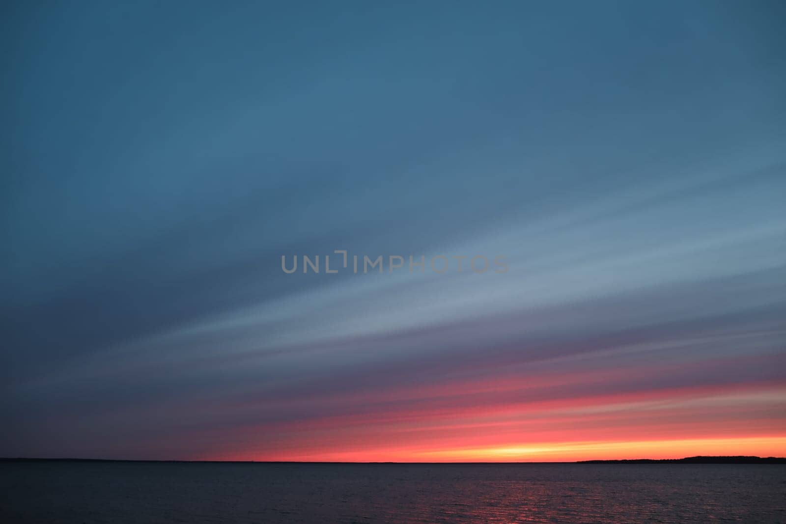 Colorful cloudy sky at sunset. Gradient color. Sky texture. Beautiful abstract nature sunset as background.