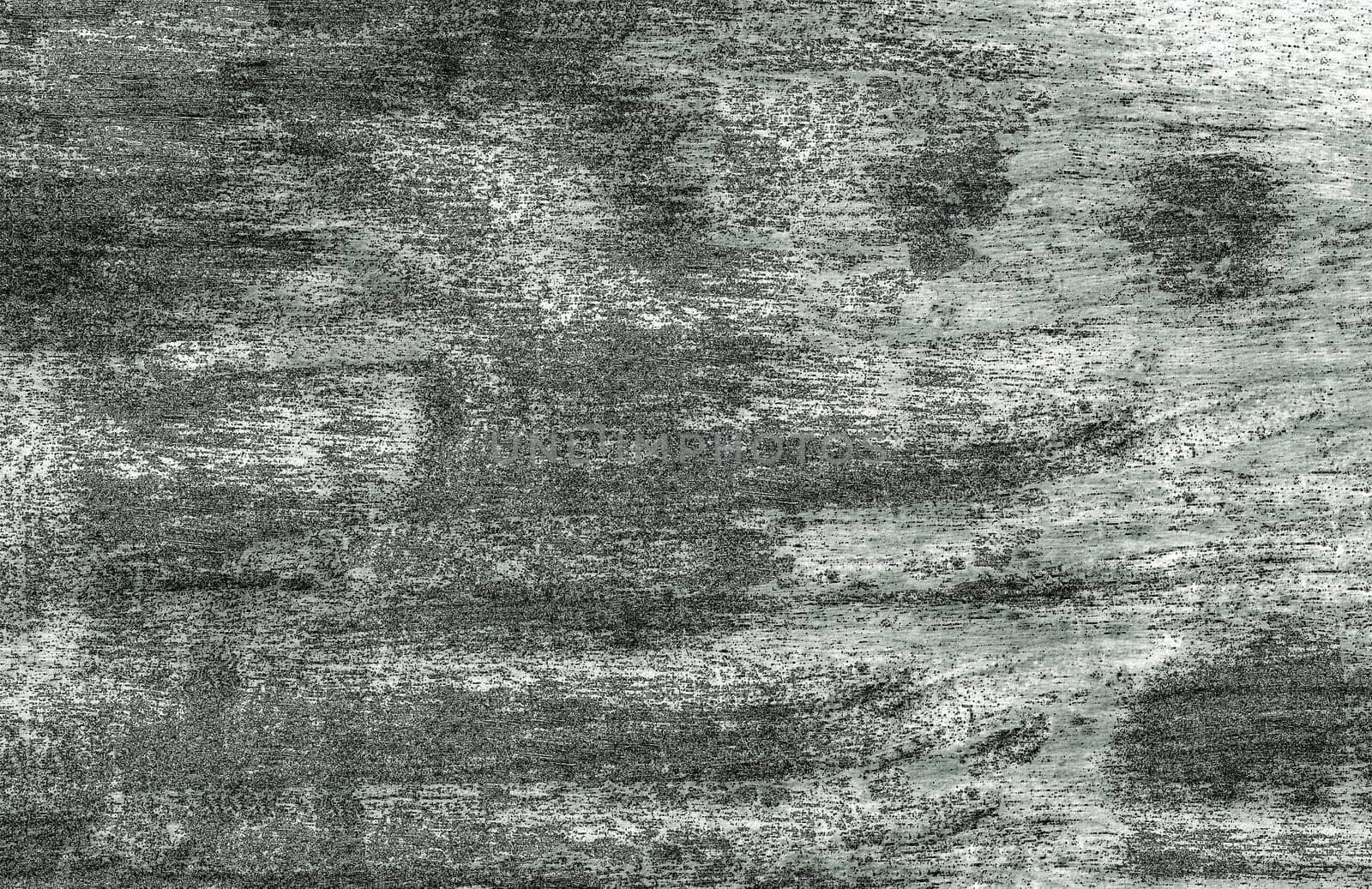 Background grunge texture with spots and raised particles on the surface in close-up