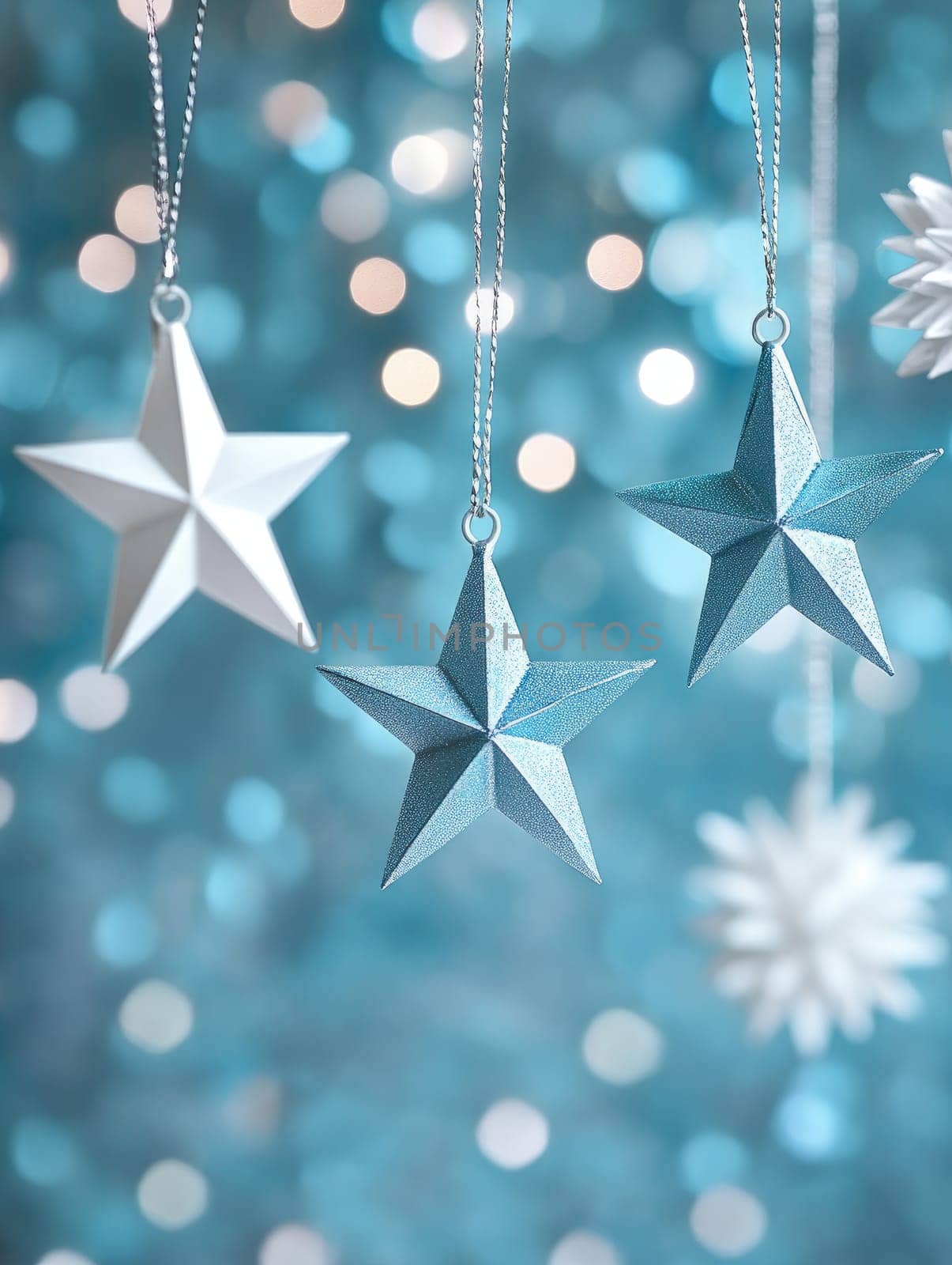 Elegant blue and silver Hanukkah ornaments with stars for festive decor.