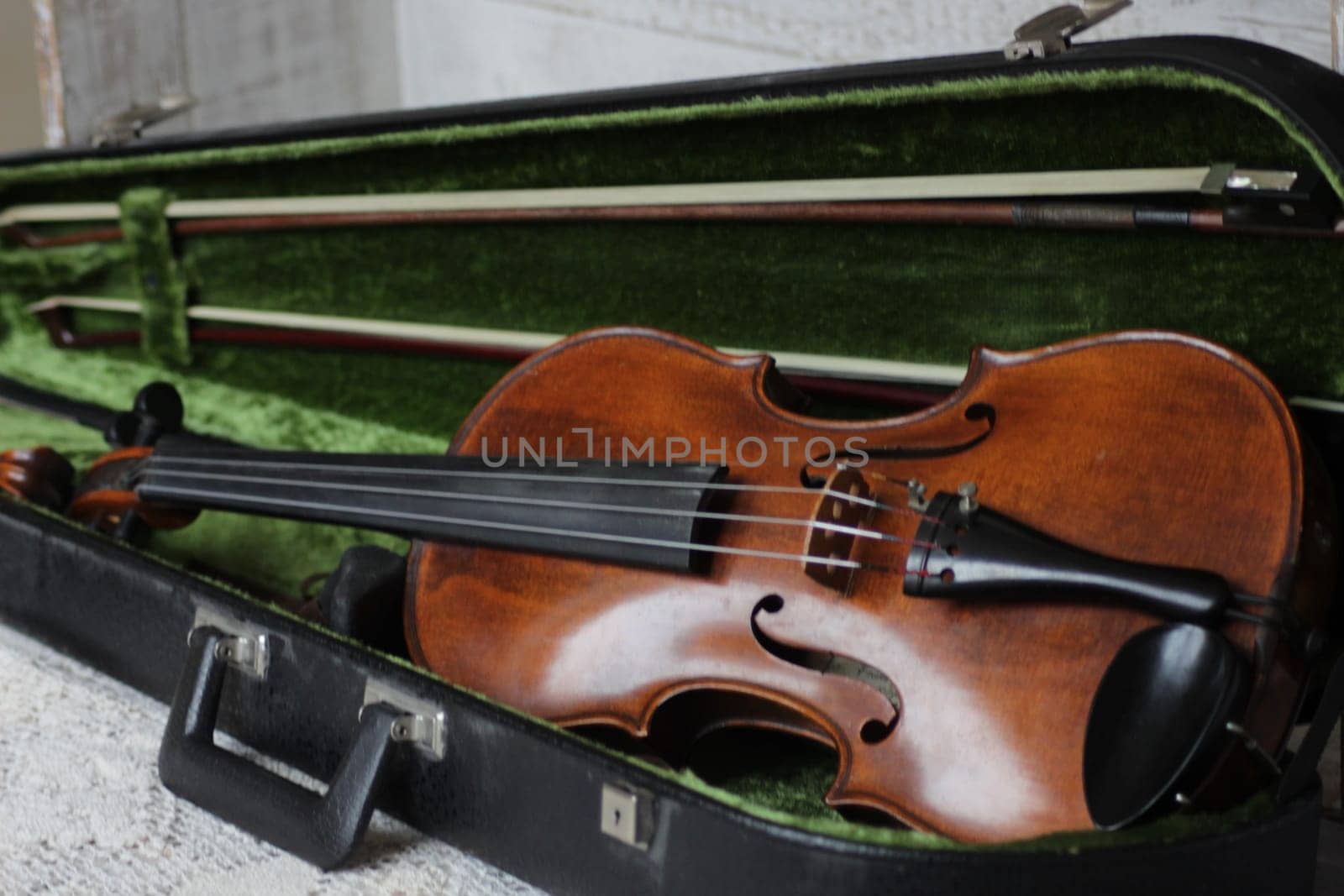 violin - an orchestral or solo professional bowed musical instrument with four strings. loved by children and adults. used in classical folk popular and jazz music. High quality photo