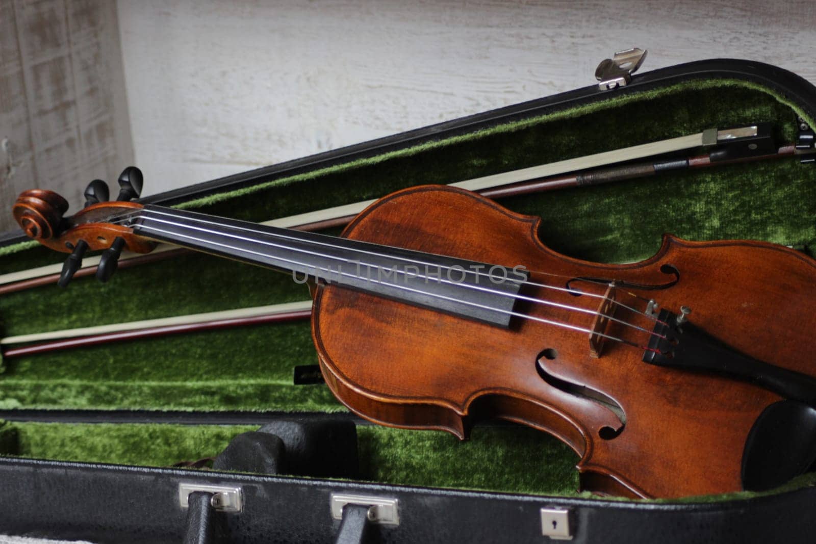 violin - an orchestral or solo professional bowed musical instrument with four strings. loved by children and adults. used in classical folk popular and jazz music. High quality photo