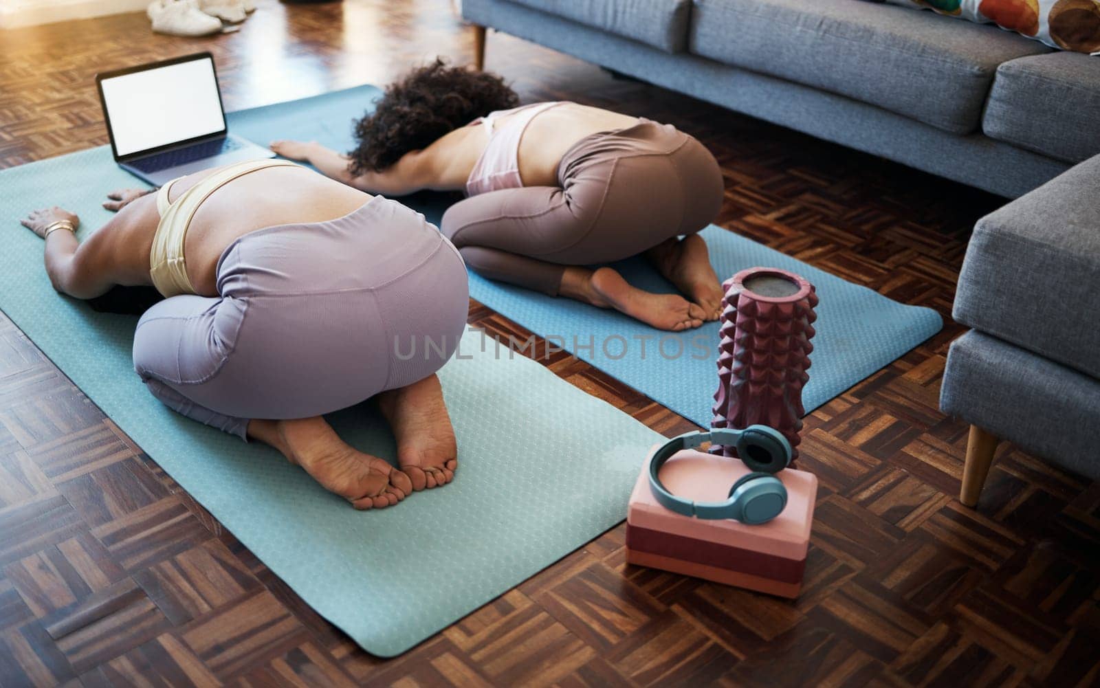 Stretching, friends and yoga online class in home, living room or lounge or streaming exercise and workout. Healthy, fitness and training with holistic on laptop for wellness in house or mockup.
