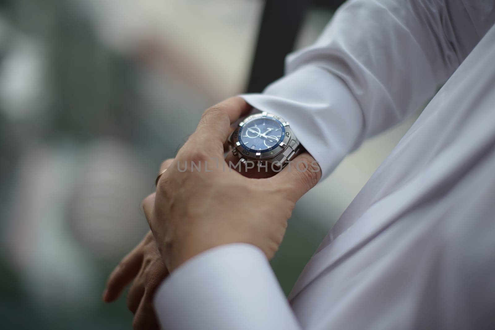 Professional man, fine gentleman, business executive fitting to their suit and preparing for daily office job, dressing to gentleman suit good for executive magazine or multimedia content creation