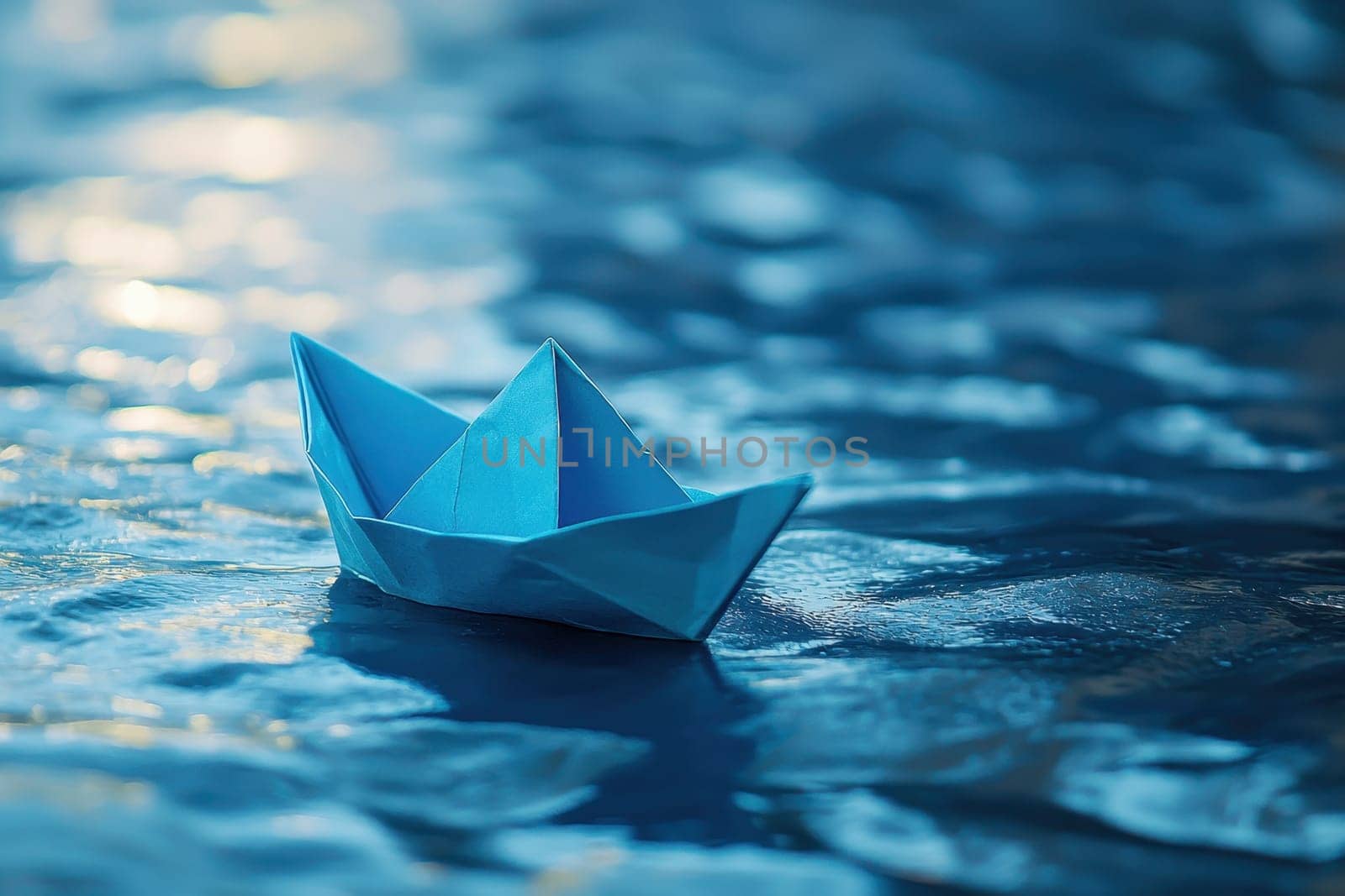 A small paper boat is floating on the surface of the water. Concept of tranquility and peacefulness, as the boat gently glides across the calm blue water