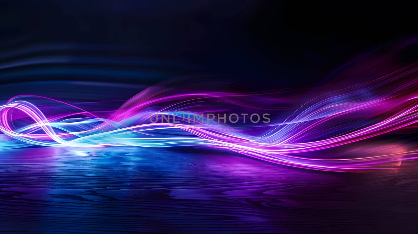 Colorful light trails in motion, creating a mesmerizing abstract background.