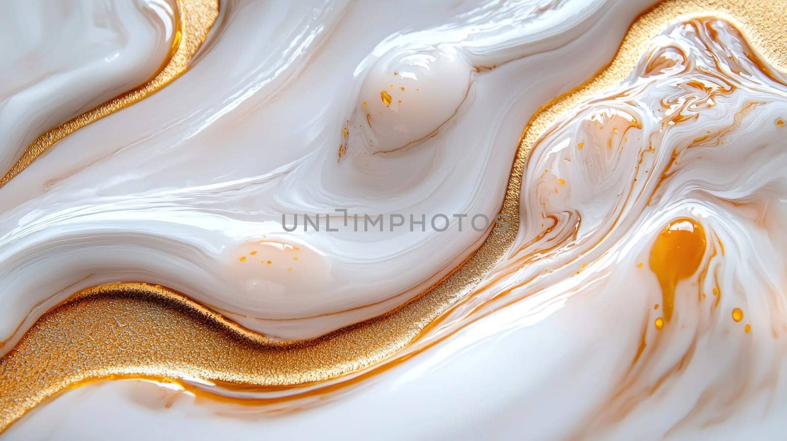 smooth, flowing marble pattern in shades of white and gold creates serene atmosphere.
