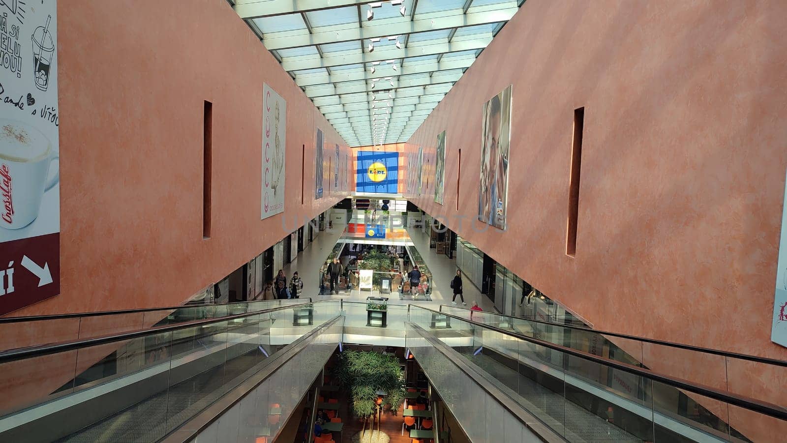 October 22 2024 Hradec Kralove, Czech Republic Europe, Kralov region, Kralovehradecky kraj, shopping mall, escalator, commercial building. High quality photo