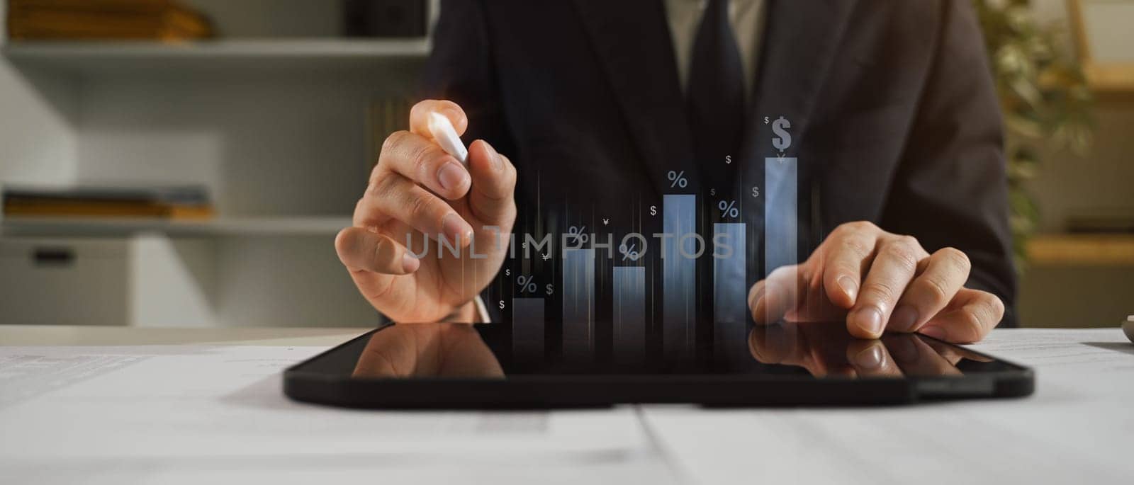 Professional businessman monitoring market growth with digital interface.