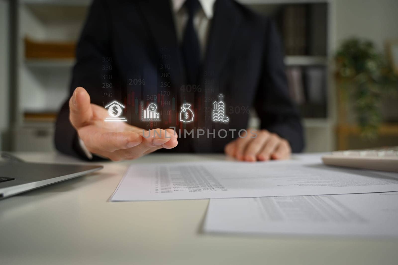 Professional businessman presenting investment options with virtual icons.