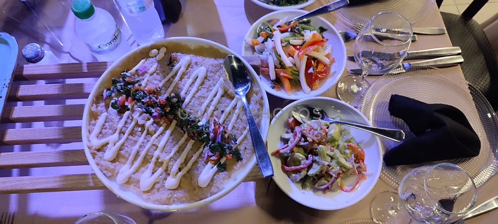salads and appetizers in a restaurant, healthy food proteins carbohydrates lunch dinner breakfast, drinks. High quality photo