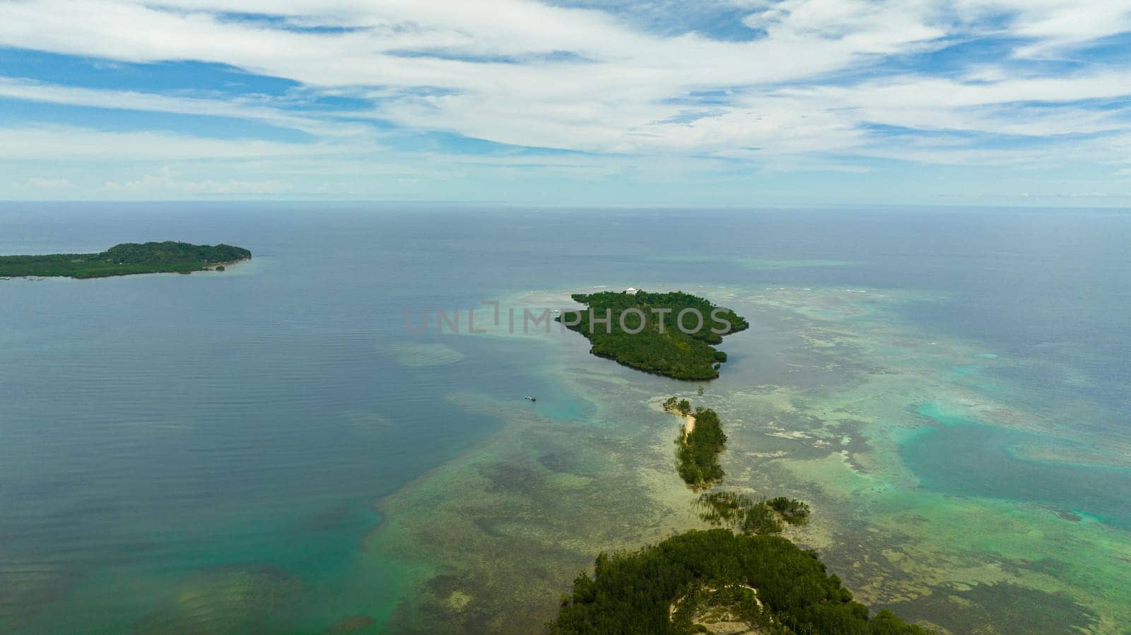 Aerial view of tropical landscape with islands and blue sea. Ocean and blue sky. Negros, Philippines