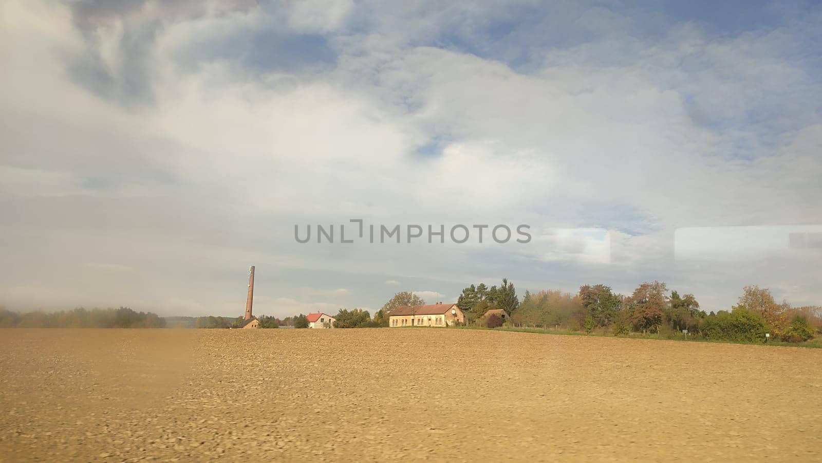 autumn landscape nature, yellow green grass plain, gray sky clouds, windows. High quality photo