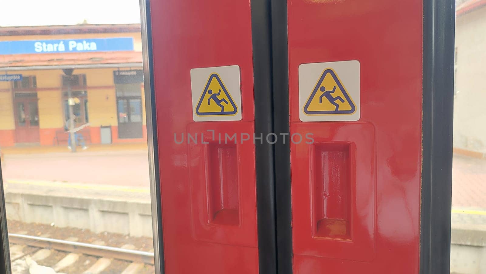 October 21 2024 Stara Paka, Czech Republic, street, railway station, building, transport, movement, sign. High quality photo