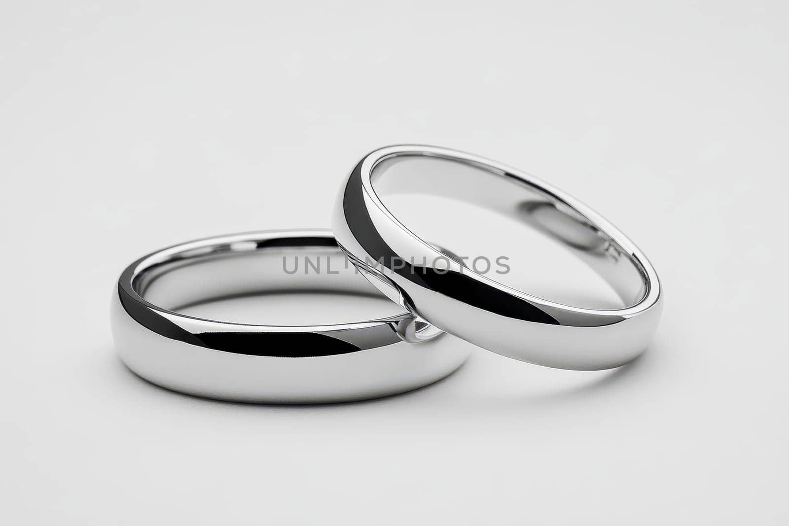 Two elegant gold wedding rings symbolizing love, commitment, and unity Perfect for marriage related themes, engagements, and romantic celebrations.
